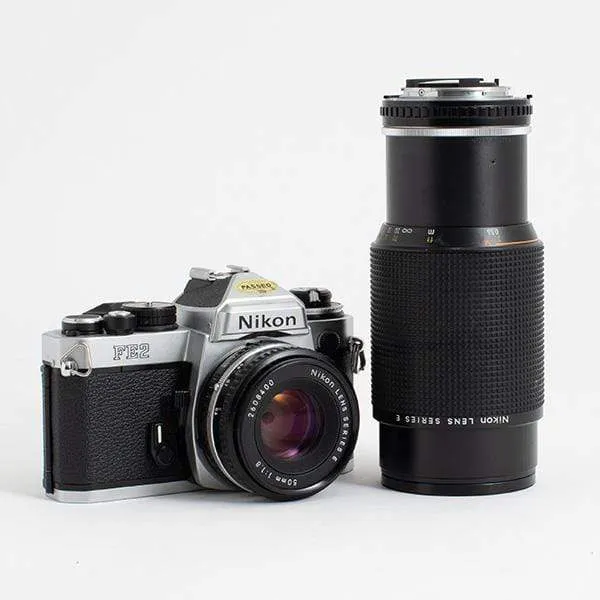 Nikon FE2 Kit with Nikon Series E 50mm f/1.8 and 70-200 f/4 lens